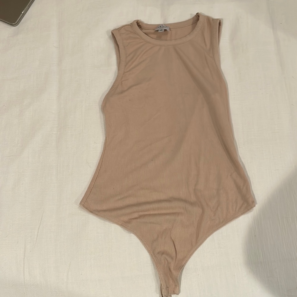 Tan body suit